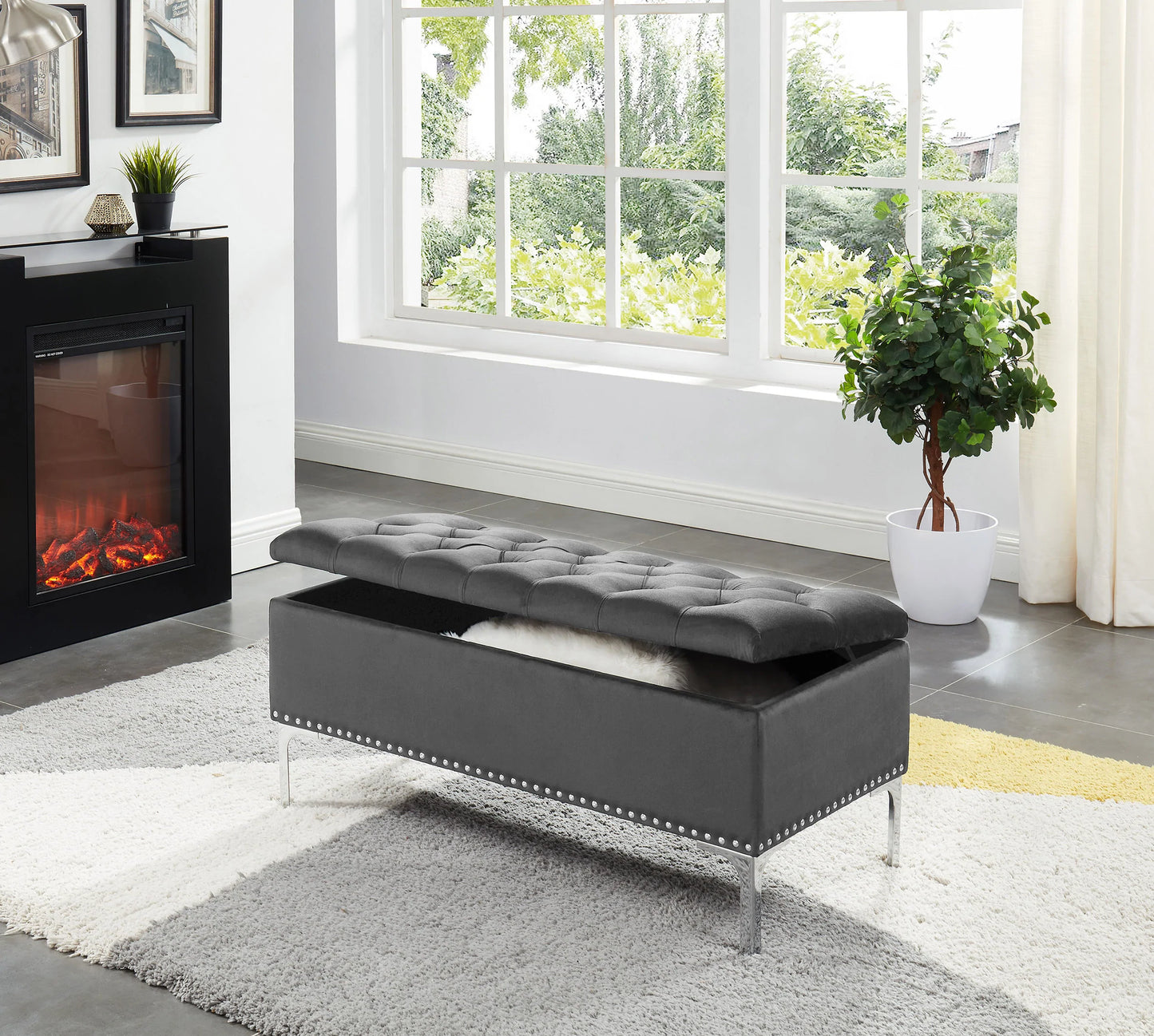 Black velvet tufted top storage bench with chrome metal legs